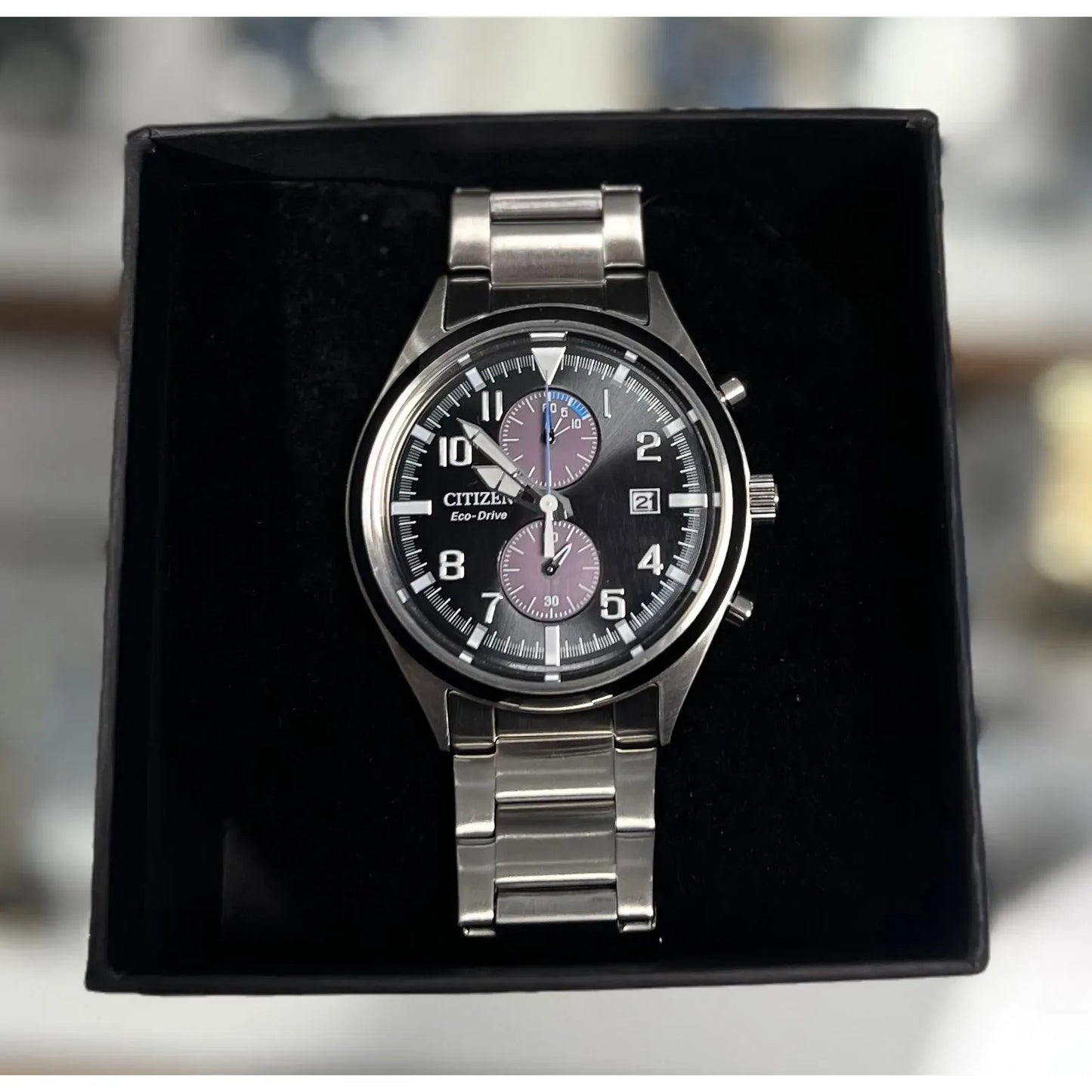 Citizen Eco Drive i stål med sort skive