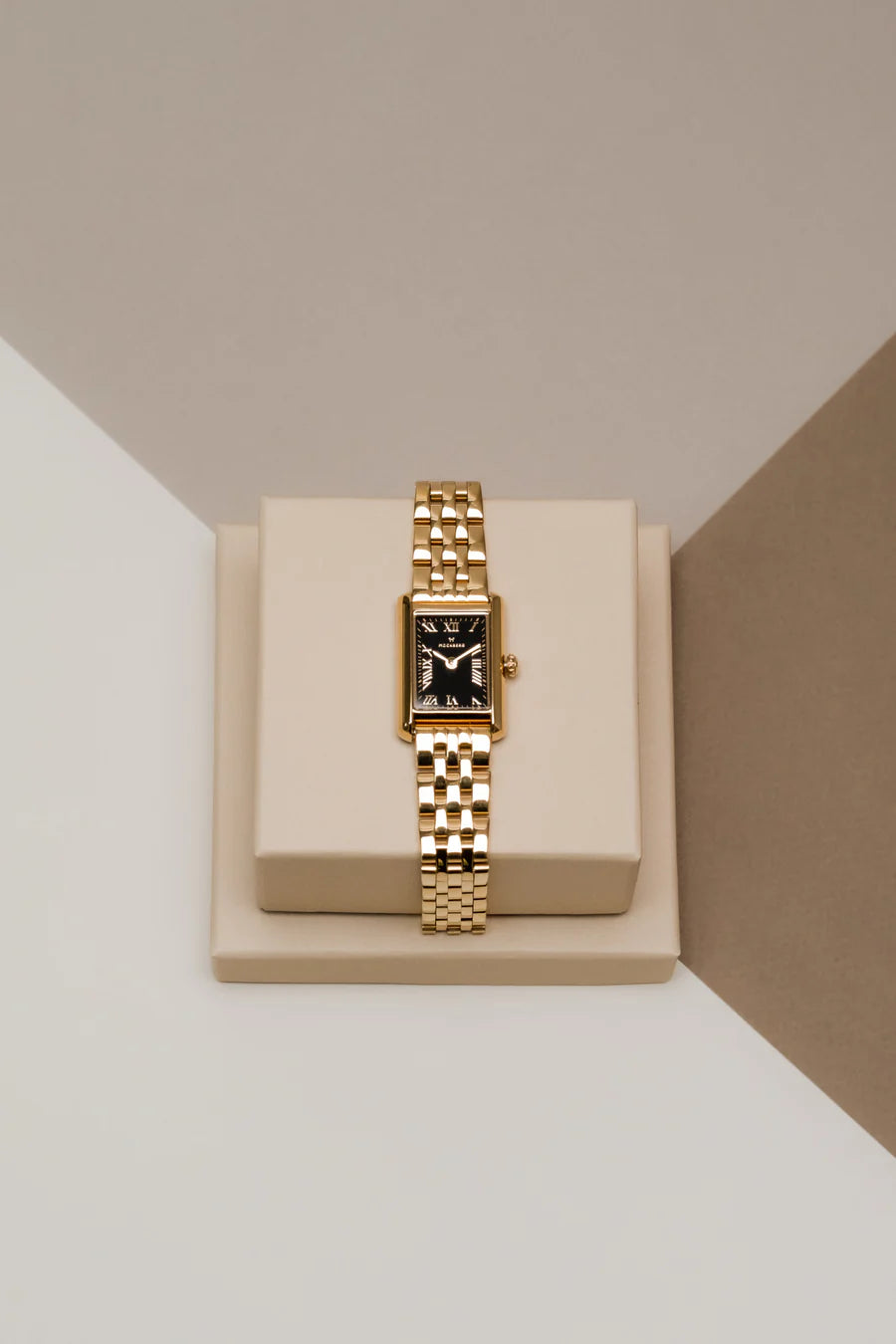 MOCKBERG TIMELESS GULLFARGET STÅL / SORT SKIVE 18 MM