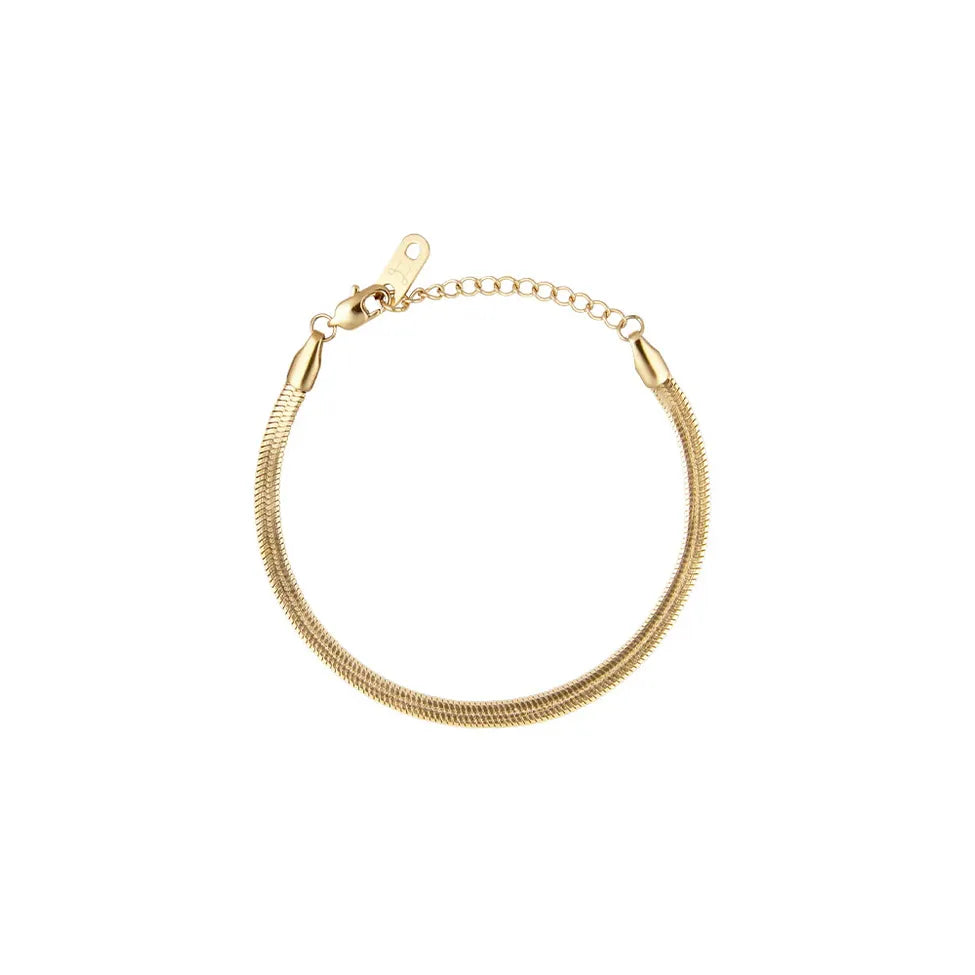 MOCKBERG THIN SNAKE ARMBÅND I GULLFARGET STÅL