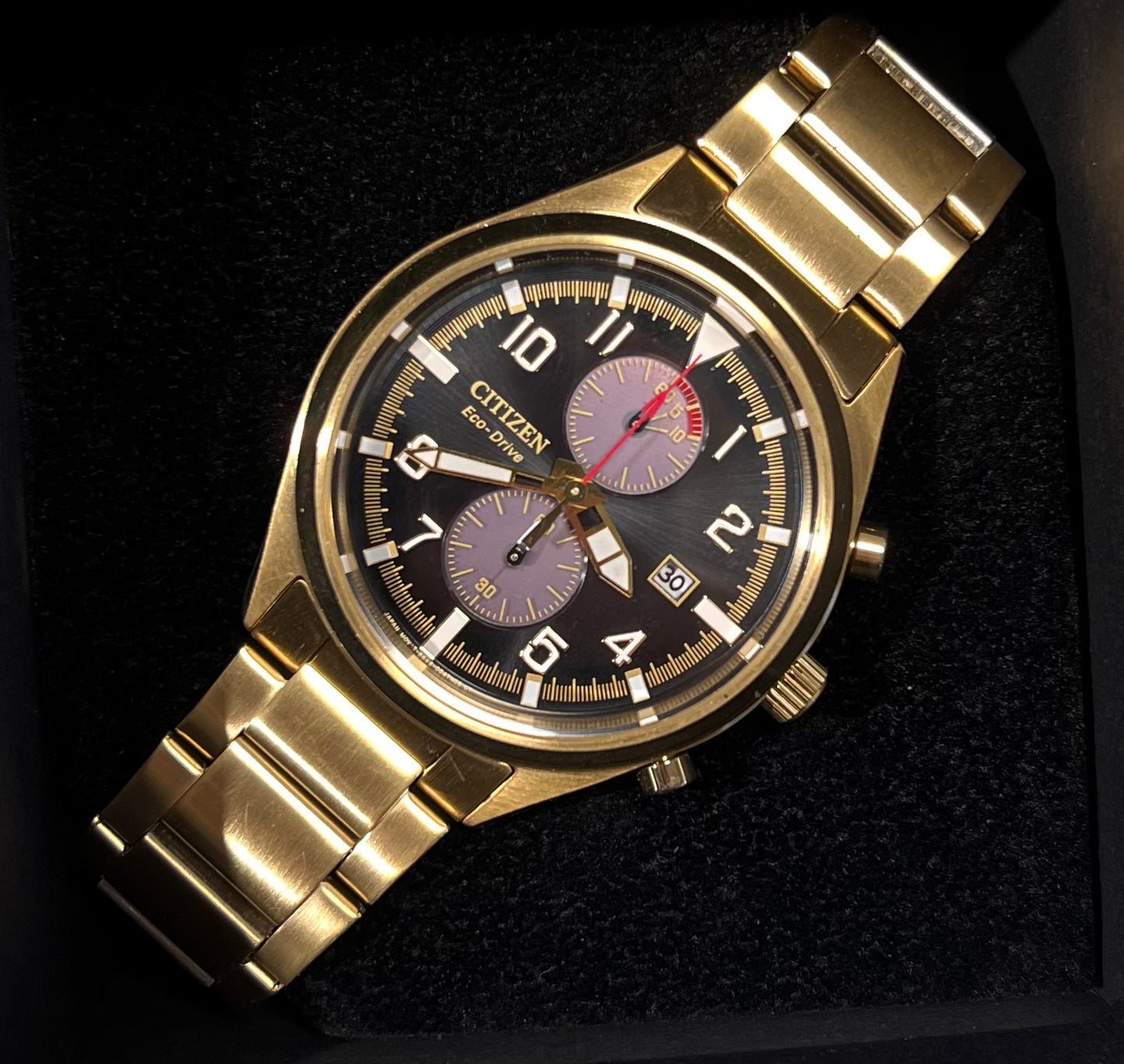 Citizen Eco Drive gullfarget med sort skive