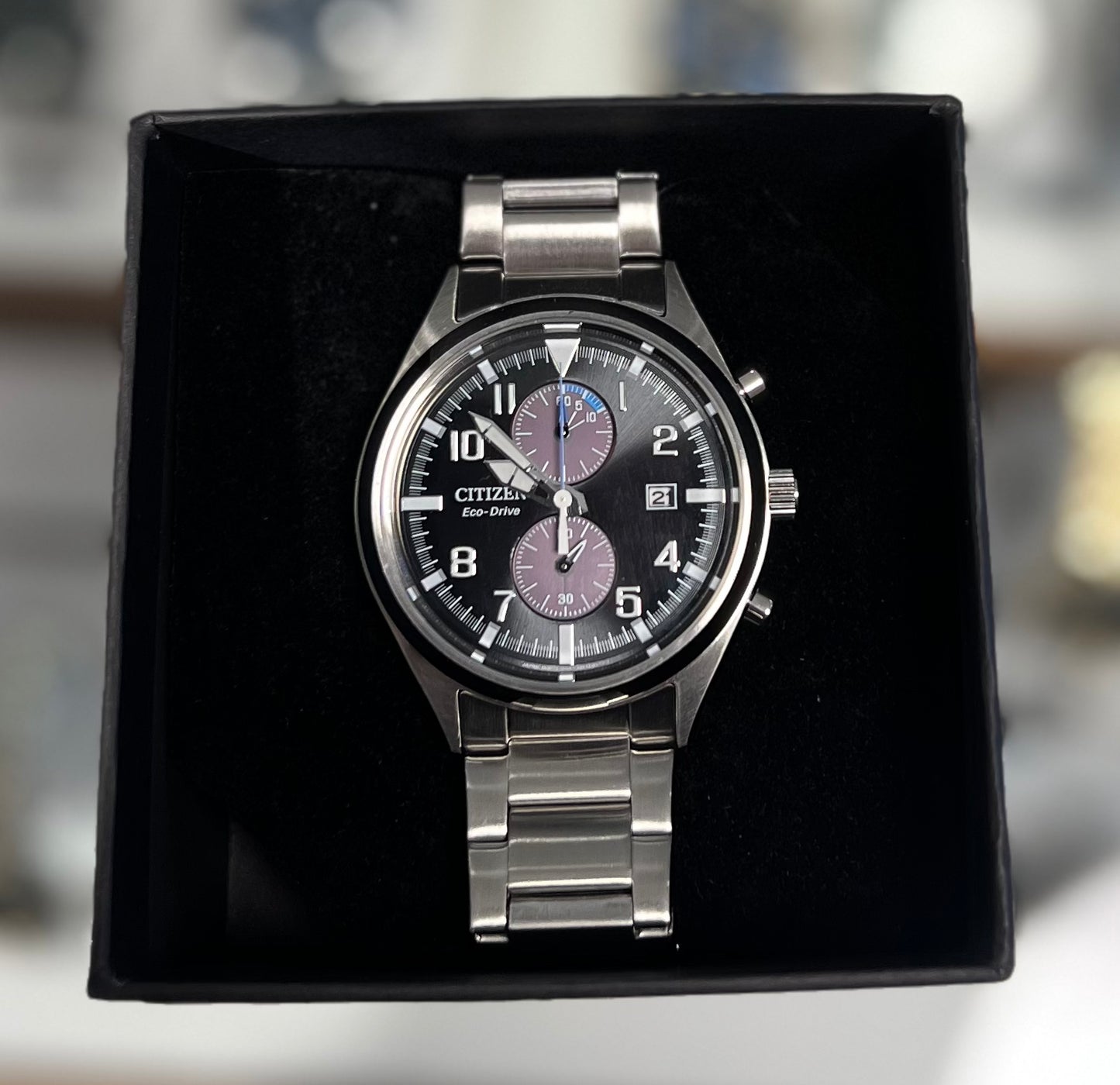 Citizen Eco Drive i stål med sort skive