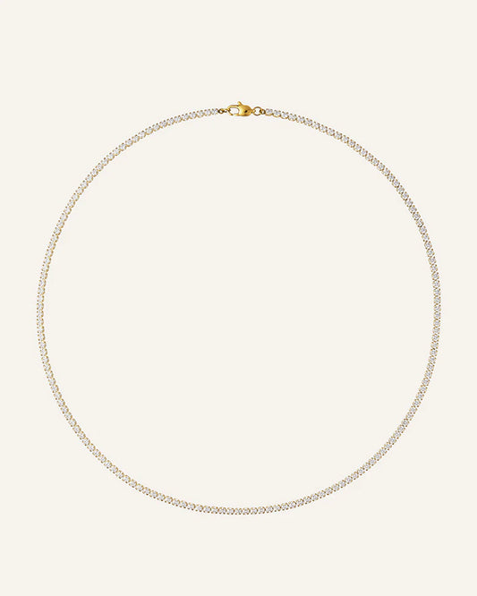 MOCKBERG SHINY TENNIS SMYKKE I GULLFARGET STÅL